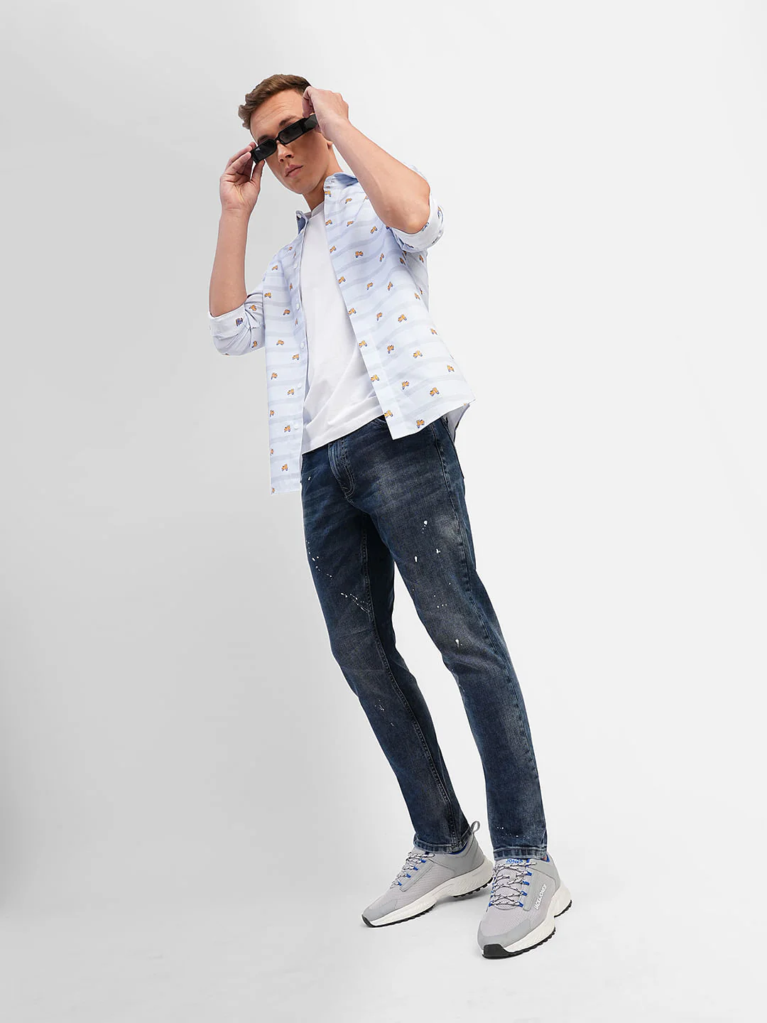 Blue Low Rise Distressed Glenn Slim Jeans